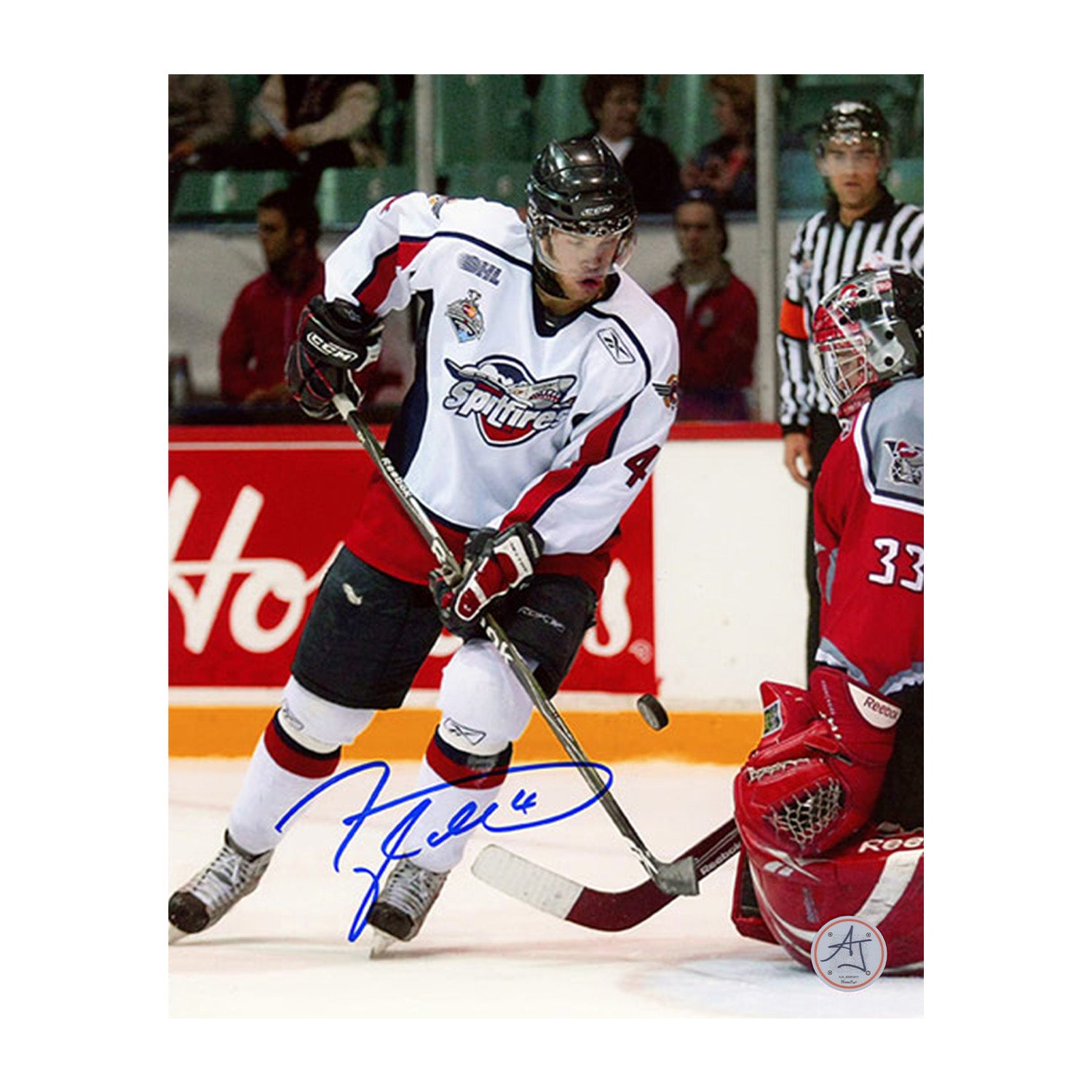 AJ Sports | Taylor Hall Autographed Windsor Spitfires Game Action 8x10 Photo