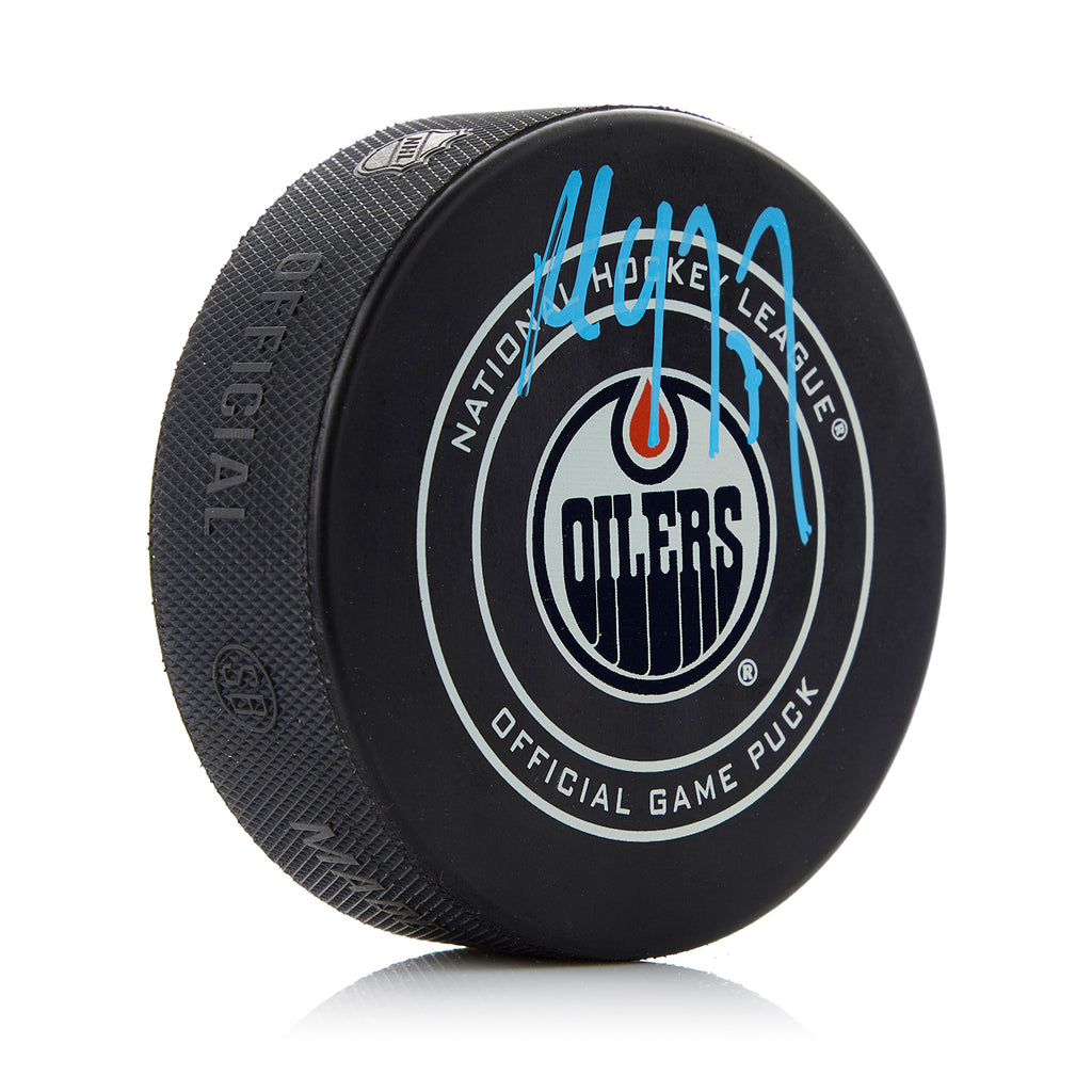 Paul Coffey Edmonton Oilers Autographed Official Game Puck | AJ Sports.
