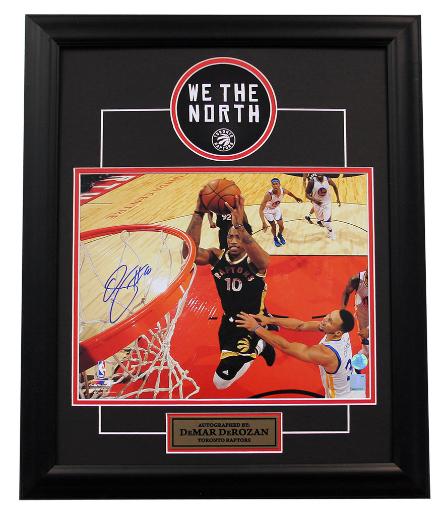 DeMar Derozan Toronto Raptors Autographed Netcam Dunk Over Curry 20x24 Frame | AJ Sports.