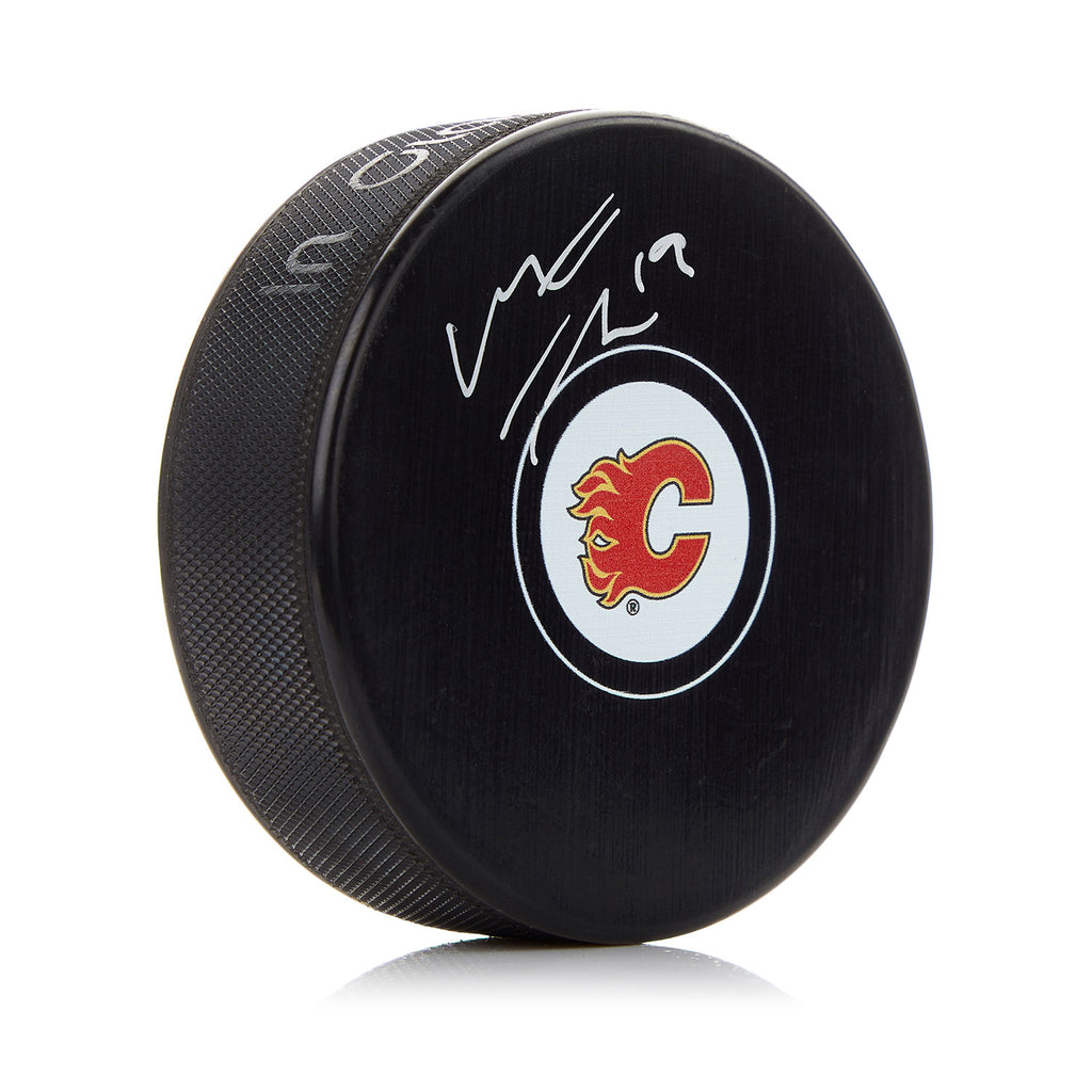 Matthew Tkachuk Calgary Flames Autographed Hockey Puck | AJ Sports.