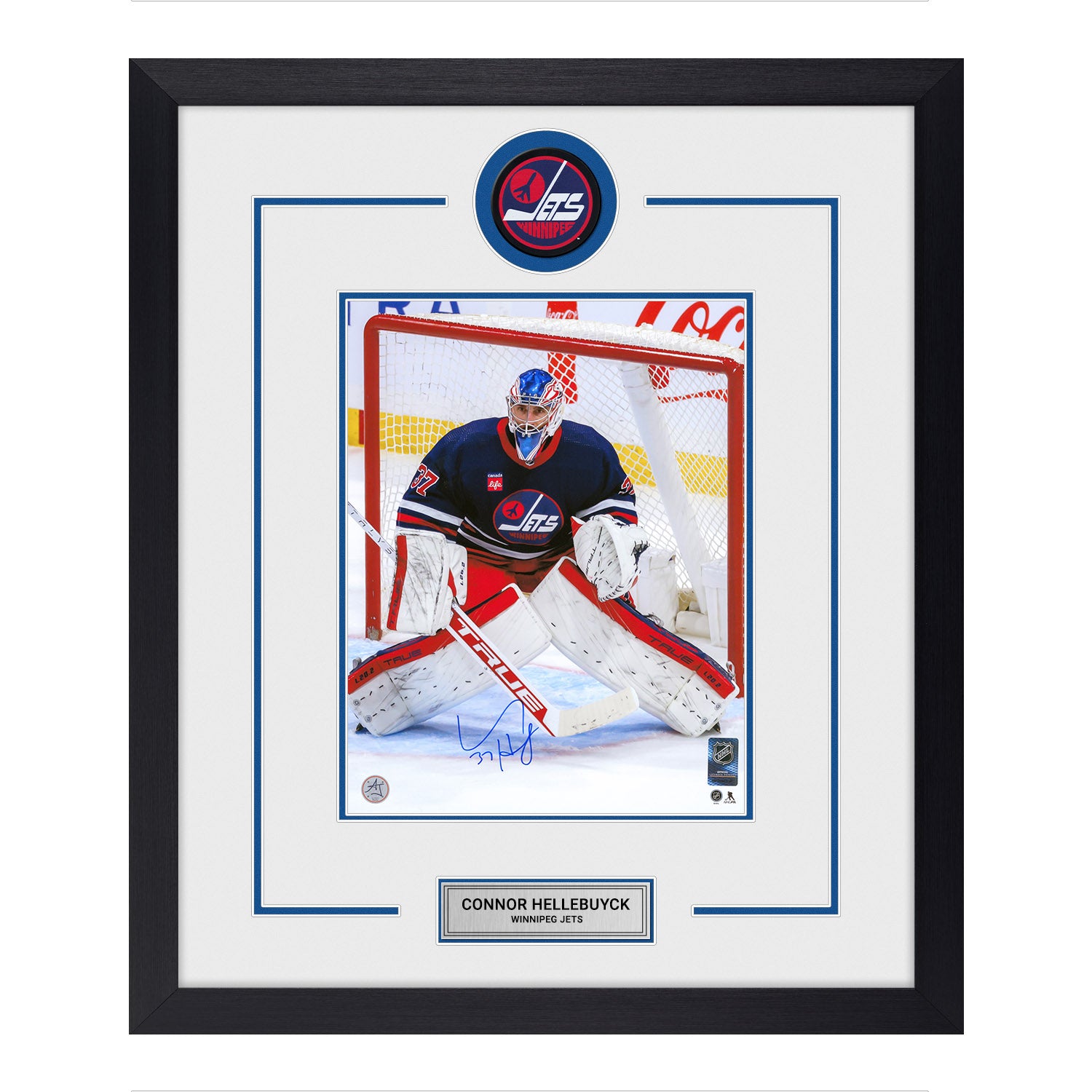 AJ Sports | Connor Hellebuyck Signed Winnipeg Jets Heritage Puck