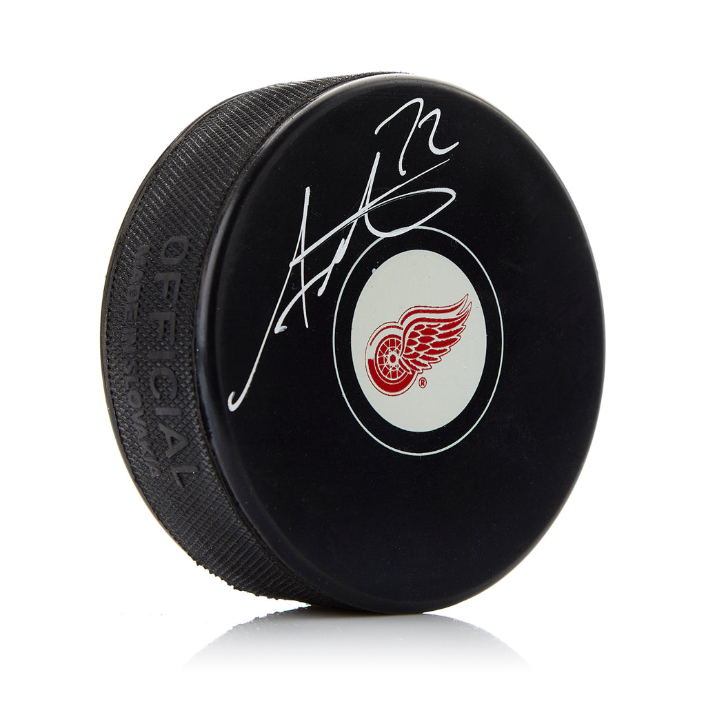 Andreas Athanasiou Detroit Red Wings Autographed Hockey Puck | AJ Sports.