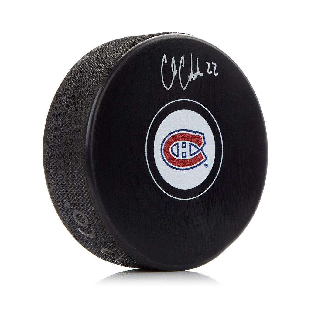 Cole Caufield Montreal Canadiens Autographed Hockey Puck | AJ Sports.