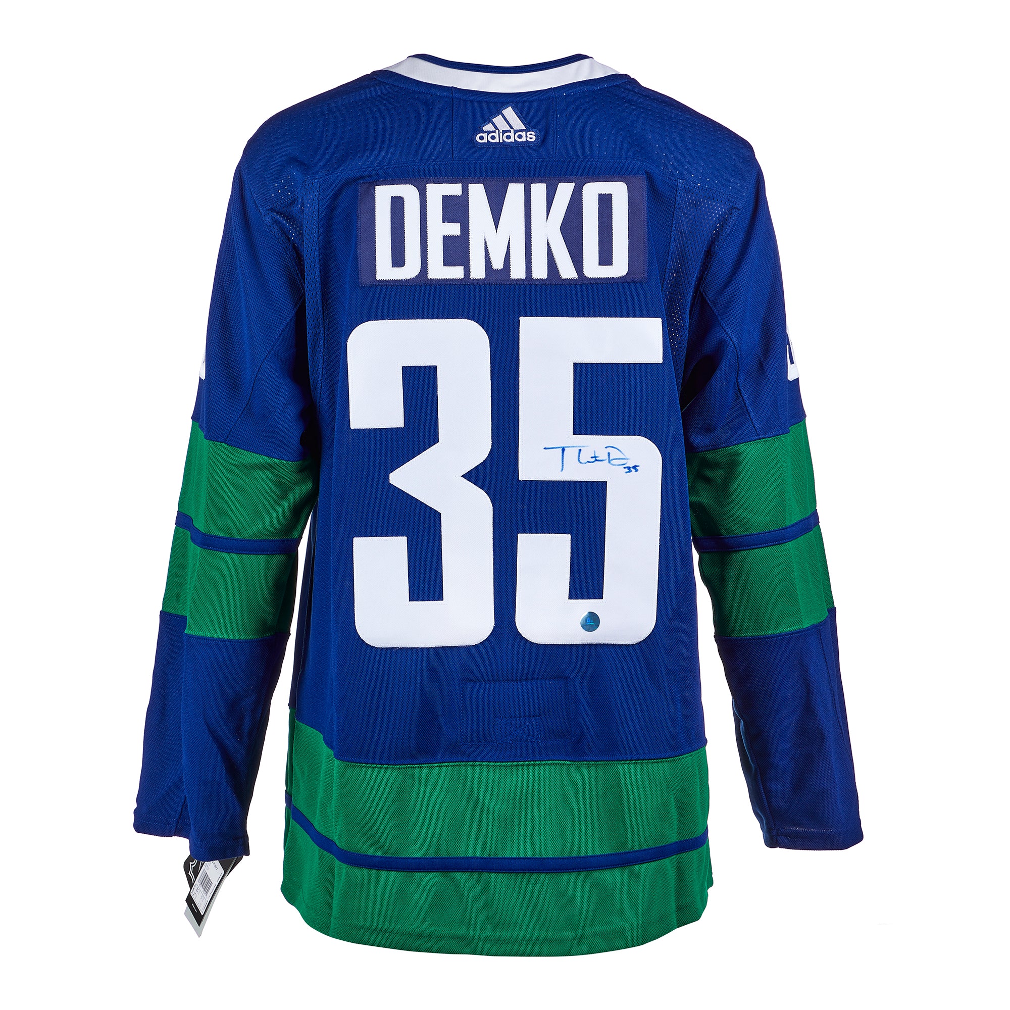 Vancouver Canucks' Thatcher Demko wears a commemorative jersey with a shoulder  patch Every Child Matters in honor of the First Nations, as players  warmed up for an NHL hockey game against the