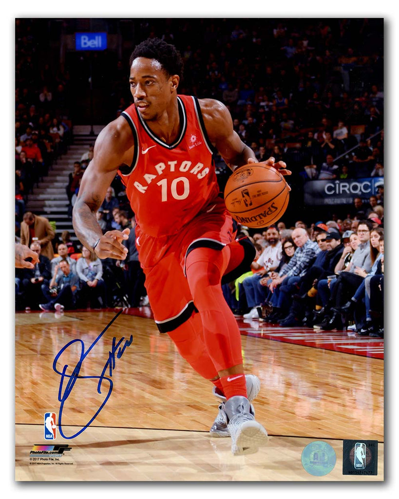 DeMar DeRozan Toronto Raptors Autographed Dribble 8x10 Photo | AJ Sports.