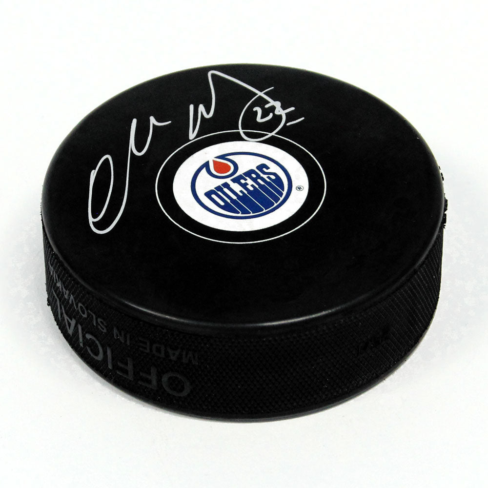 Charlie Huddy Edmonton Oilers Autographed Hockey Puck | AJ Sports.
