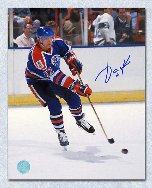 Jari Kurri Edmonton Oilers Autographed Puck Sniper 8x10 Photo | AJ Sports.