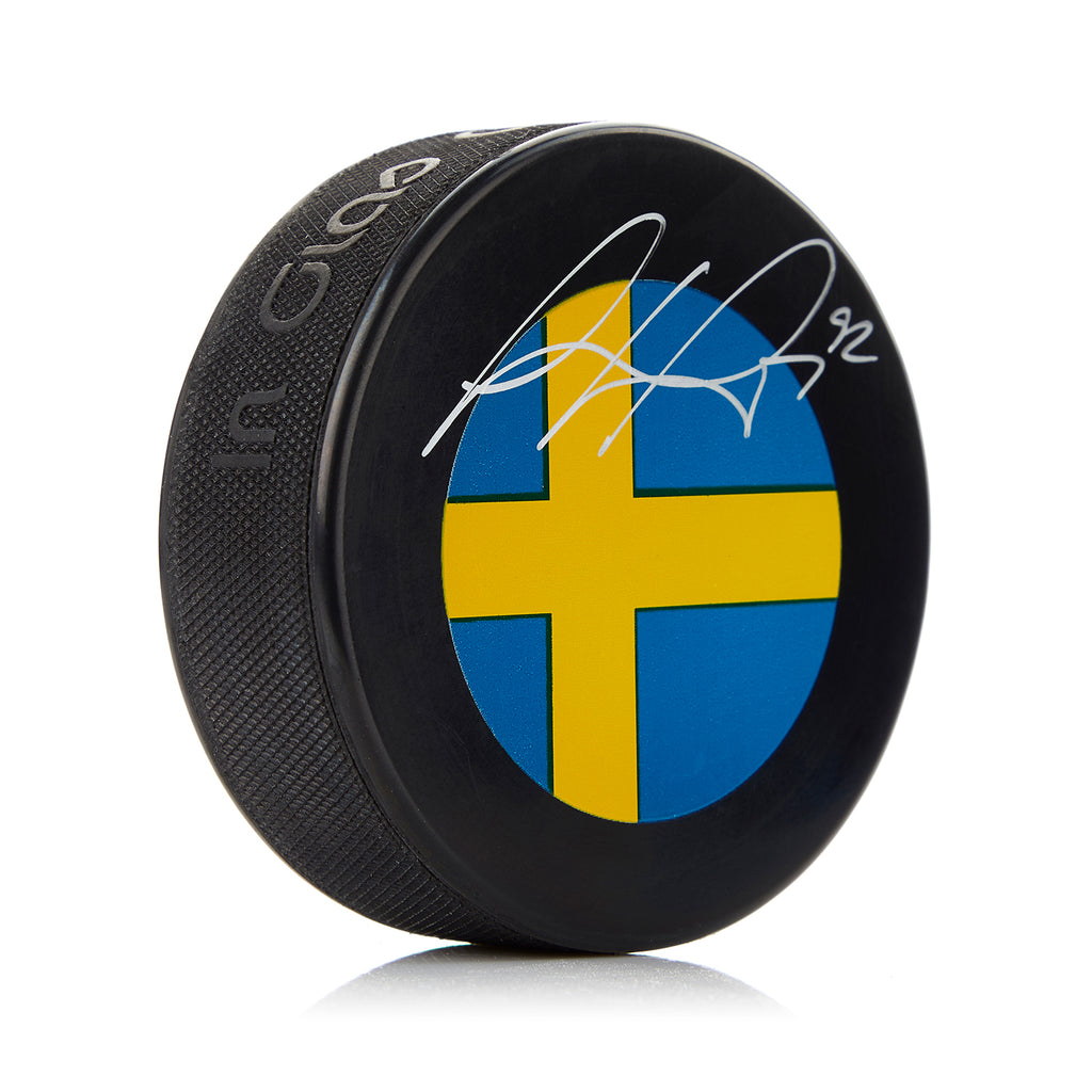 Gabriel Landeskog Autographed Sweden Flag Hockey Puck | AJ Sports.