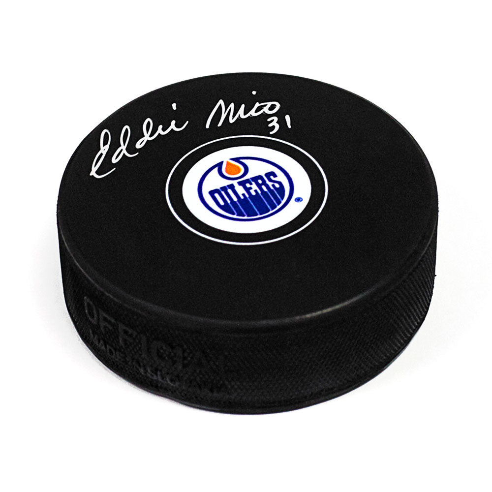 Eddie Mio Edmonton Oilers Autographed Hockey Puck | AJ Sports.
