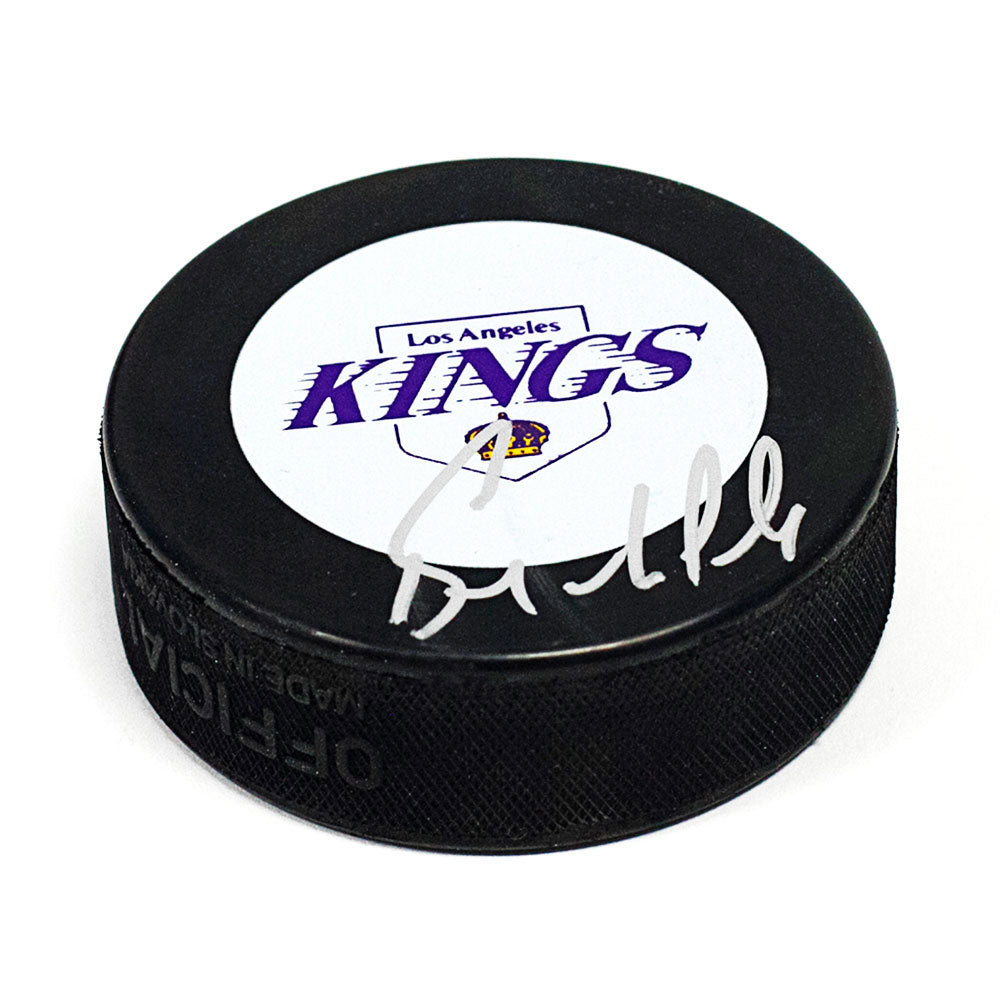 Bernie Nicholls Los Angeles Kings Autographed Purple Logo Hockey Puck | AJ Sports.